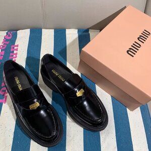 Women's Miu Miu black loafers